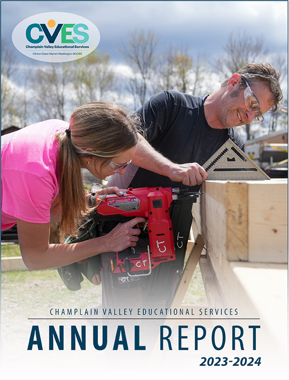 Student and teacher working on a project for construction trades.